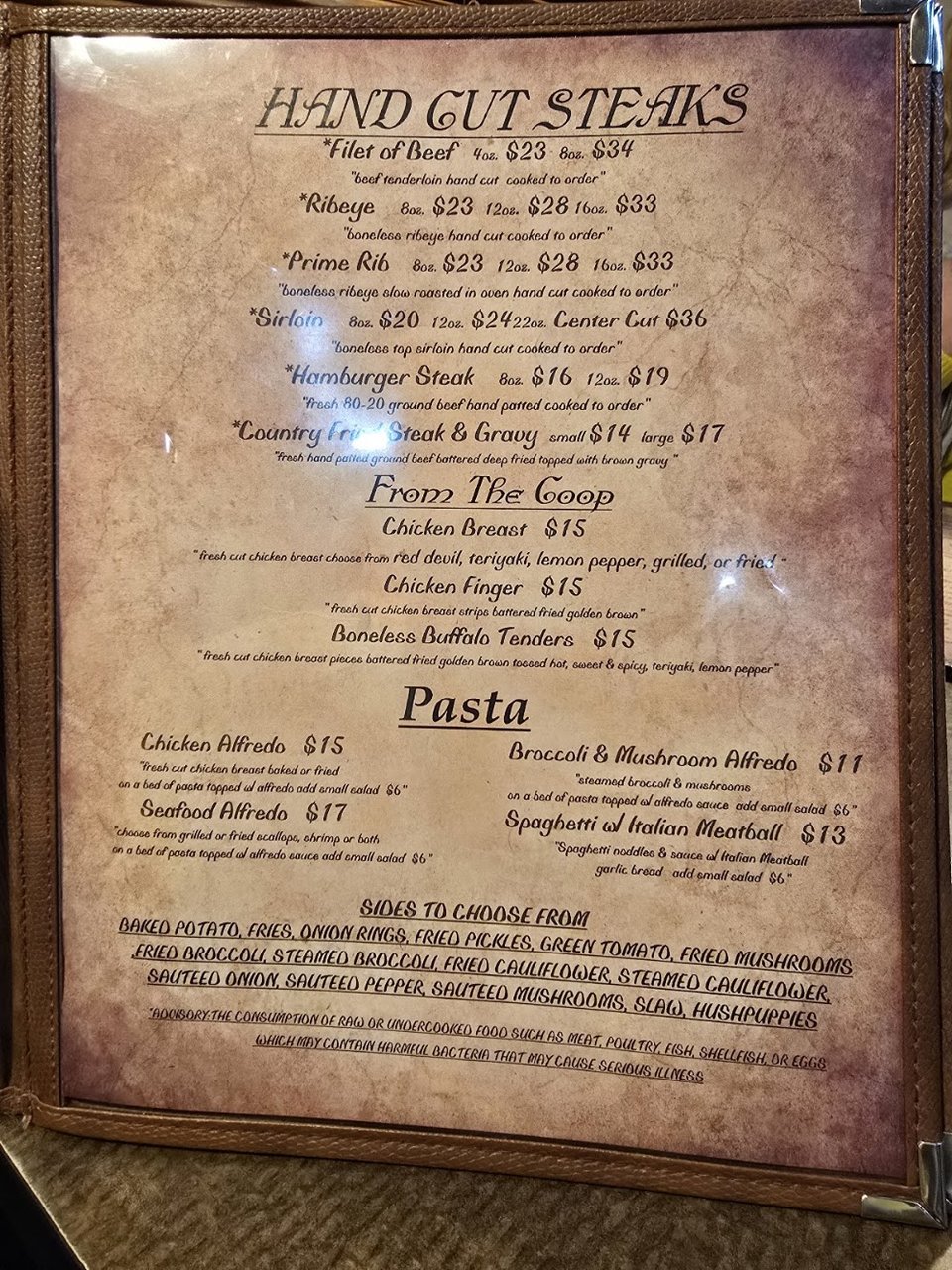 Close-up of seafood choices and side dishes.