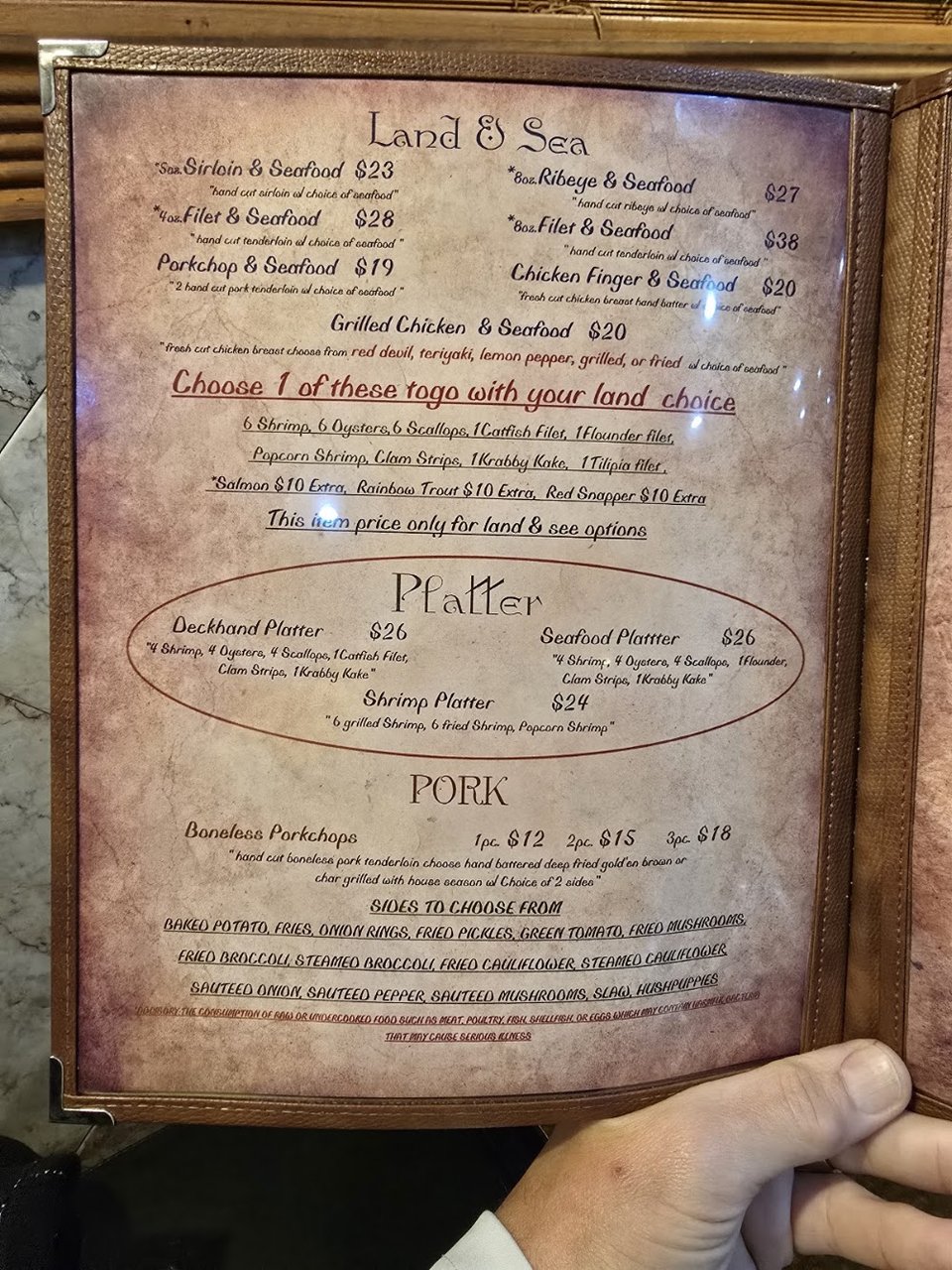 Dinner menu with steak, seafood, and fried sides.